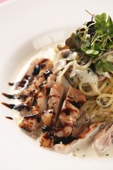 chicken cream pasta on plate