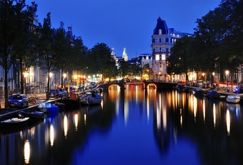 Fototapeta na wymiar Canal of Amsterdam at night, Netherlands