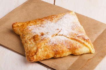 Fresh bun with powdered sugar