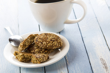 oatmeal cookies coffee breakfast cook rustic wooden background
