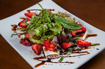 salats strawberries, feta cheese and balsamic sauce.The colors o
