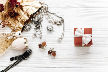 stylish red present and luxury jewelry  accessories on white rus