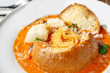 Pasta with tomato Sauce in Bread