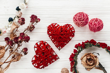 stylish hearts and roses  on white wooden background. happy vale