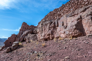 Fototapeta premium Sasanid era ruins on hills above Abyaneh - one of the oldest villages in Iran