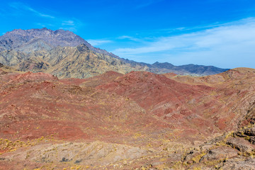 Red mountains seen from hills above Abyaneh - one of the oldest villages in Iran