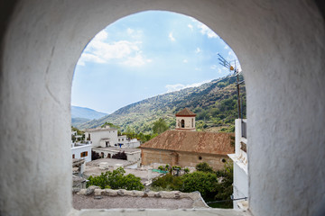 View of the church and part of a village in the south of Spain