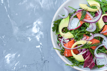 Green light salad with smoked salmon and avocado. Love for a healthy food concept