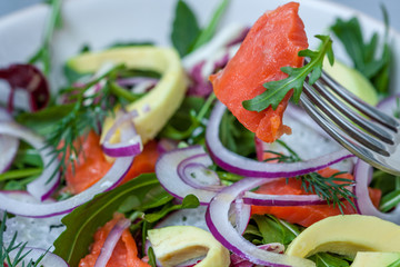 Green light salad with smoked salmon and avocado. Love for a healthy food concept
