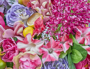 variety of colorful fake flowers closeup