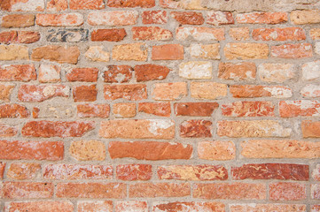 Fototapeta premium Brick wall in old city Venice Italy