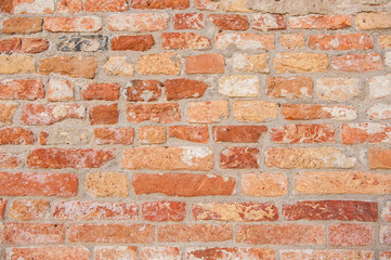 Brick wall in old city Venice Italy