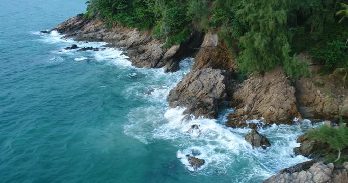 4k aerial view of the sea and coastline of the beach in Phuket, Thailand - video in slow motion