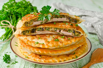 Meat with mushrooms and herbs baked in pastry