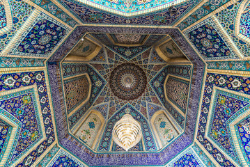 Fototapeta na wymiar Ceiling of main entrance to Shah Cheragh Mosque and mausoleum in Shiraz city in Iran
