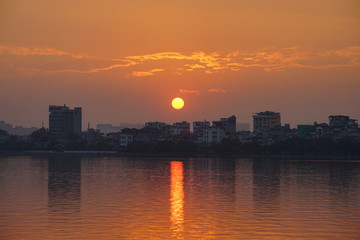 Fototapeta na wymiar Sunset on West lake (Ho Tay), Hanoi, Vietnam