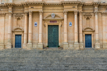Close up on door of Saint Nicholas of Myra Cathedral in Noto city, Sicily in Italy