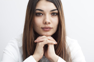 Fototapeta premium Portrait of young woman on gray background
