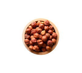 nuts hazelnuts without shell in wooden bowl isolated on white background, top view