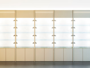 Blank wooden showcase design mockup, 3d rendering. Clear white wood show case with empty glass shelves mock up. Store wall with modern furniture. Shop front view with bright rack template.