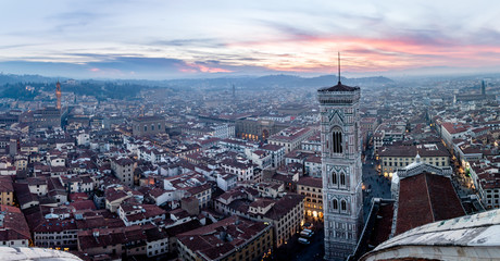 Panoramic sunset from the Dome of Florence Cathedral with Giotto’s Campanile Bell Tower, Tuscany...