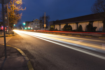 Fototapeta na wymiar red white acceleration speed motion on night road