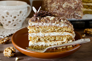 Honey cake with walnuts and grated chocolate