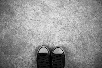 Shoes on concrete background.