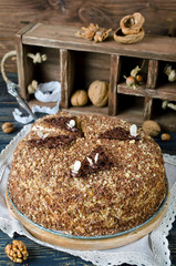 Honey cake with walnuts and grated chocolate