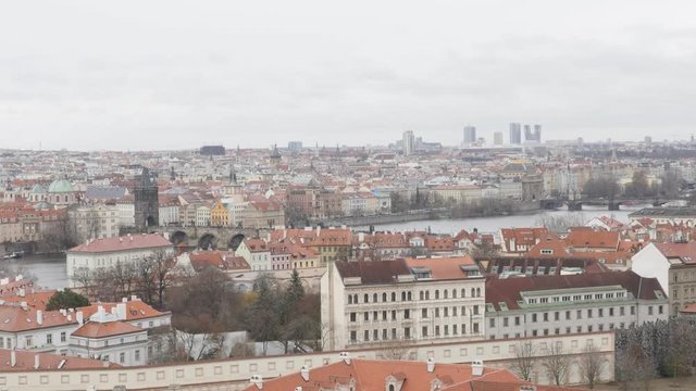 Tilting on rooftoops famous spires and domes in capital of Czechia 3840X2160 UHD footage - Beautiful cityscape of Czech Republic by the day slow tilt 2160p UltraHD video