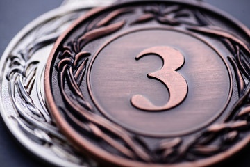 Bronze and silver winners medallions