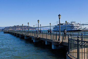 Fototapeta na wymiar Pier Seven, steamer and Oakland Bridge