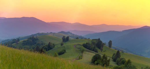 Panorama of mountains at sunset time. Carpathian mountains. Ukraine.