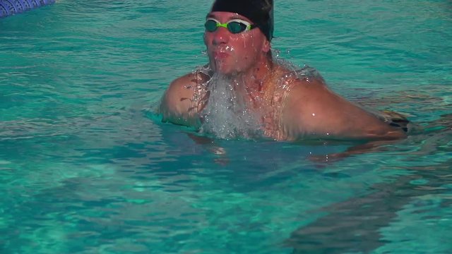 Swimmer performs Butterfly