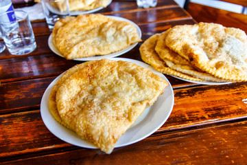 A traditional dish of the Crimean Tatars - pasties. They are mad