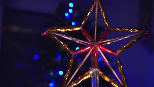 Christmas tree decorated with antique toys and garlands.
