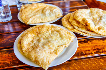 A traditional dish of the Crimean Tatars - pasties. They are mad