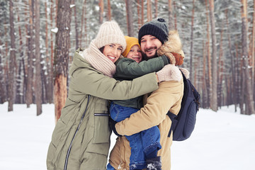 Obraz premium Delightful family hugging each other showing the truly love whil