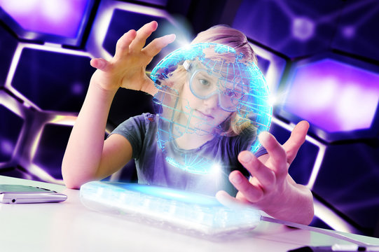 Boy interacting with floating digital globe