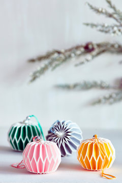 Colourful Christmas baubles with colour coordinated ribbon