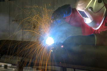 Welder working and carrying jobs of welding pipeline repairing