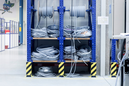 Electrical cables on shelf in engineering plant