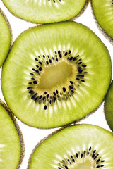 Fresh juicy kiwi slices background