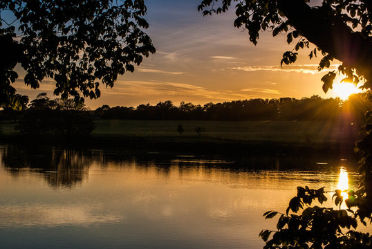 Sunset over Pitfour lake, Aberdeenshire, Scotland. 