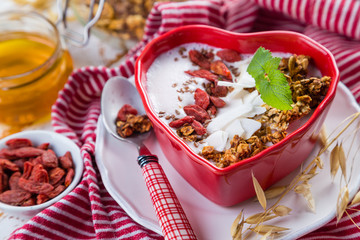 Valentine's day breakfast - granola with yogurt, goji berries and coconut