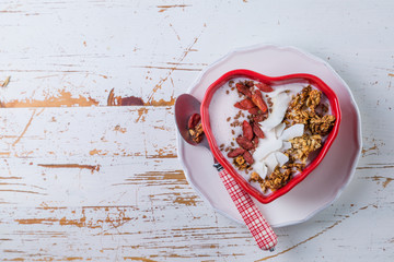 Valentine's day breakfast - granola with yogurt, goji berries and coconut