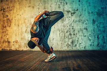 Man dancing on wall background