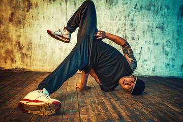 Man dancing on wall background