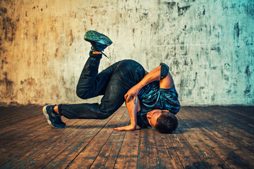 Young man break dancing