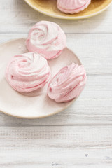 Strawberry marshmallows on a white background, horizontal, selective focus